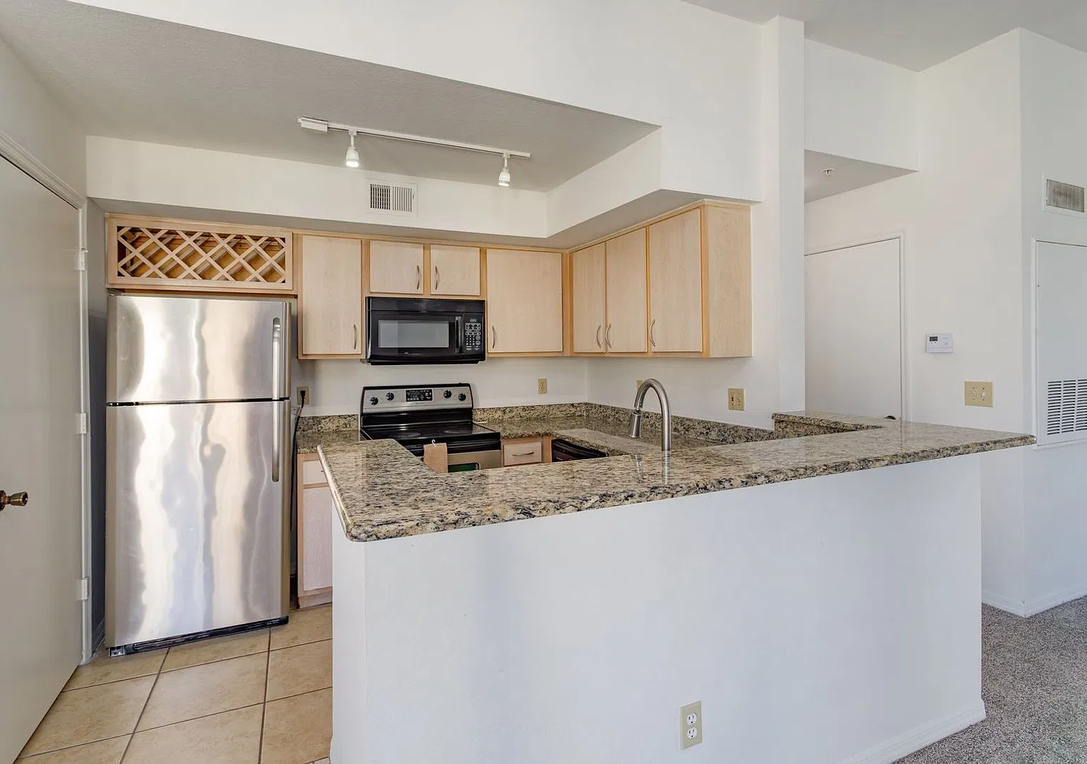 Stylish Condo Living at Its Best A Gated Community — Photo 3