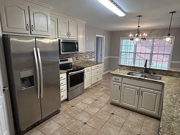 Renovated kitchen with stainless steel appliances