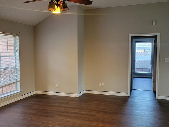View from living room as you look into the hallway to the Master suite. Pantry cabinet is to the right and laundry room is the to left on your way to the 2 car garage.