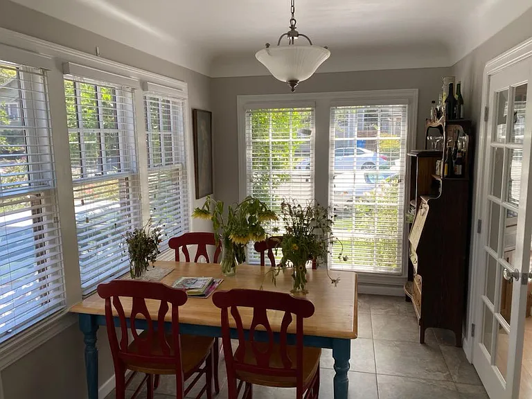 Beautiful Breakfast Room, lots of light with French doors.