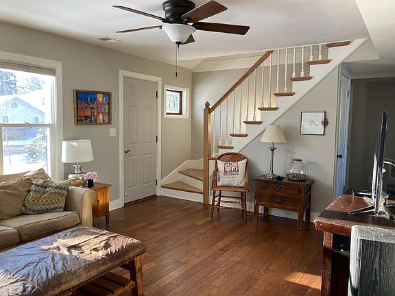 Wider living room view.