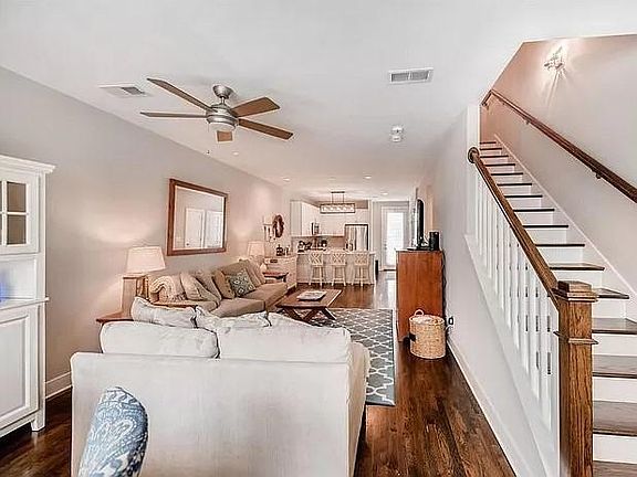 Living / kitchen area with powder bathroom