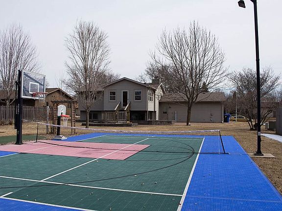 Endless fun on your own professional lit sports court and putting green!