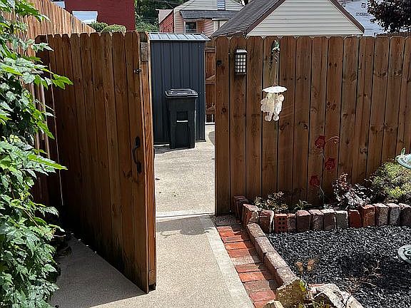 Gate to parking & shed