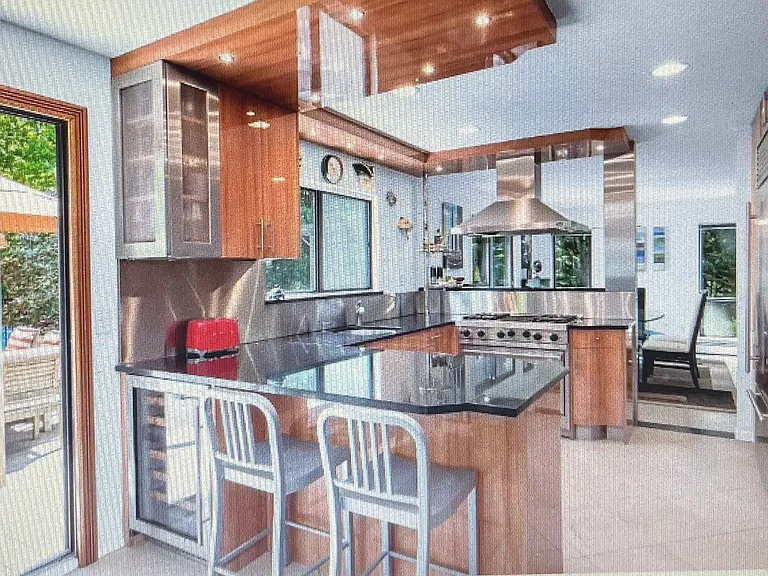 Cook's kitchen with high end appliances; Viking Stove, Sub Zero Refrigerator/Freezer, Bosch Dishwasher, Sub Zero Wine Cooler