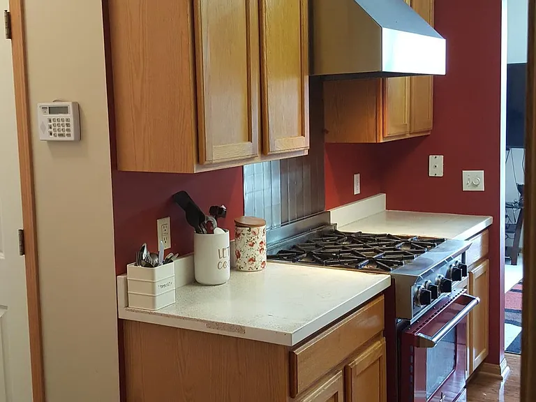 Kitchen view from Mudroom ( Picture do not reflect the granite counter tops)