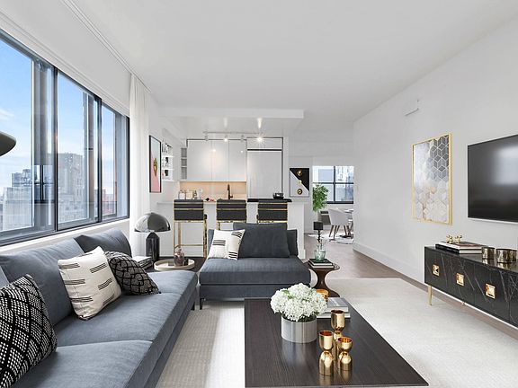 Living room and kitchen with open floor plan