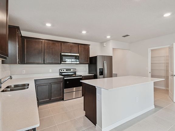 Spacious Kitchen with Stainless Steel Appliances
