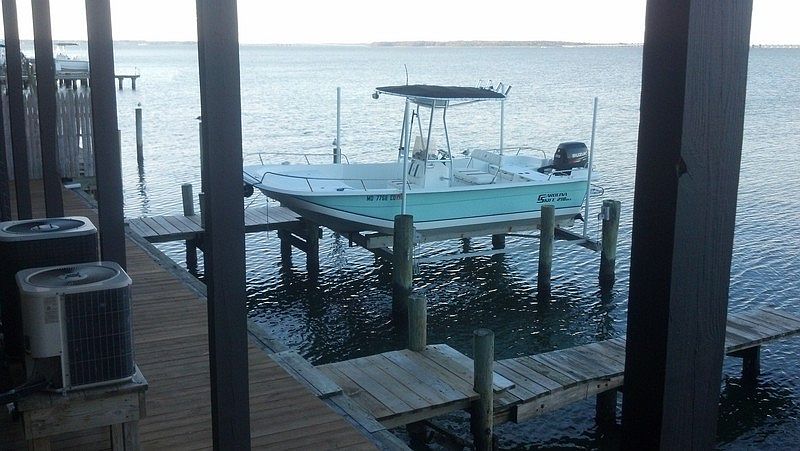 Back Deck View of boat dock and lift