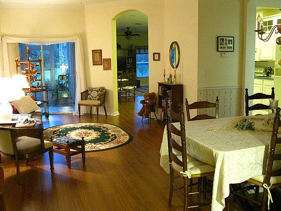 From Front door: Dining area 15X17 Living 11X12; doors to kitchen, family Rm.