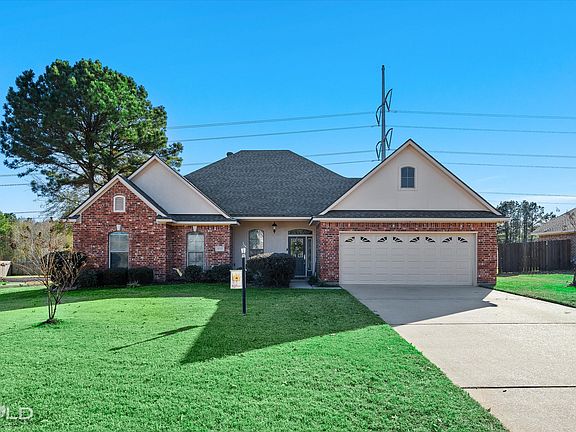 Straight house view with two car garage