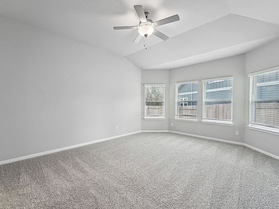 Enjoy the natural lighting in the primary bedroom.