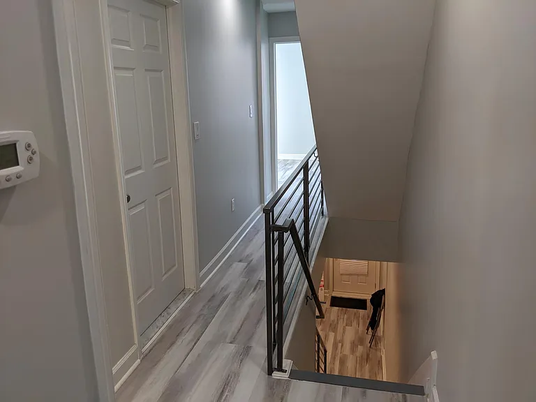 Second floor hallway to laundry room and the master bedroom