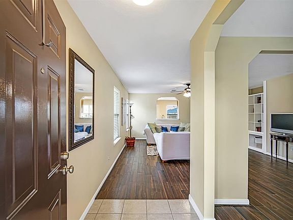 This entry view is the family room with the kitchen at the very end.