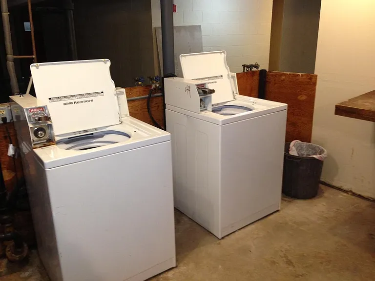 Laundry room in building (basement)