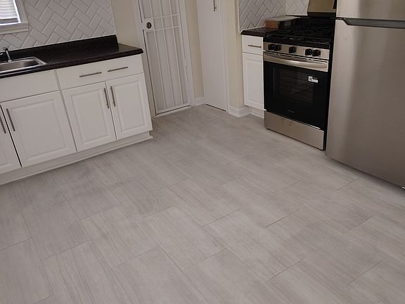 Kitchen with new stainless steel appliances