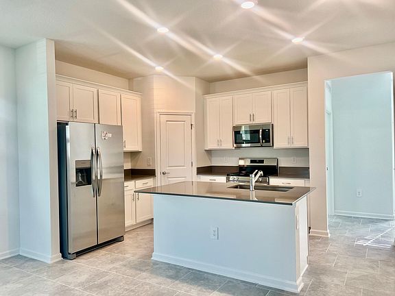 3rd image of 6068 Blissful St