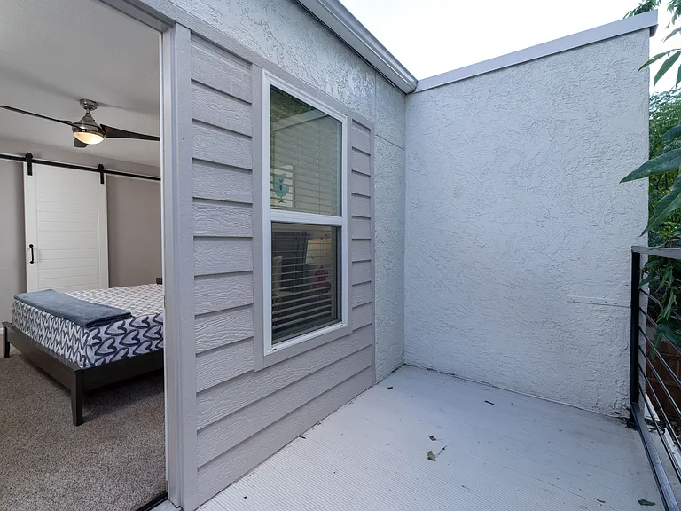 Outdoor porch from the bedroom.