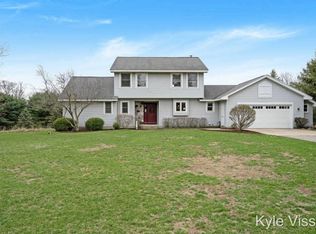 891 Cramton Ave NE, Ada, MI 49301