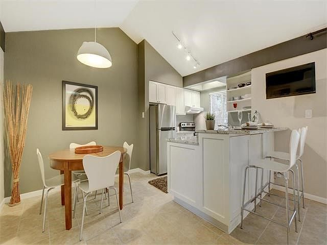 Recently updated condo in 78704 two minutes from downtown Austin. Kitchen was totally gutted and redone with custom-made wood cabinetry by a local master cabinet maker. Granite counter tops and brand-new stainless steel appliances.