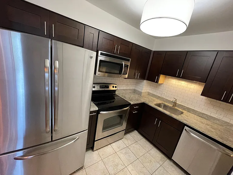 Kitchen with Stainless Steel Appliances, Garbage Disposal, Under-Cabinet Lighting, and More