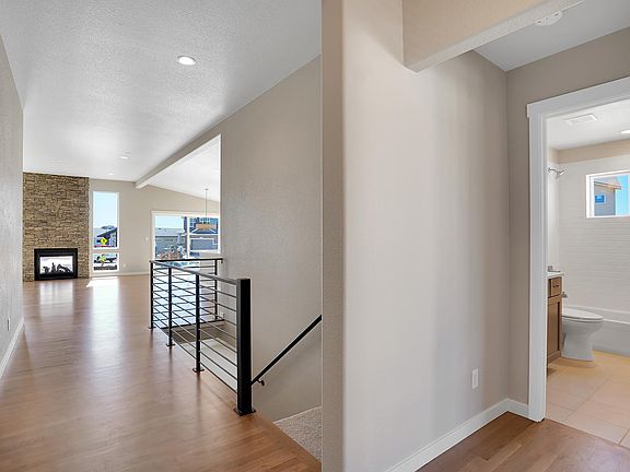 Entry leads to open main level. Photo representing home to be built and may demonstrate optional fe