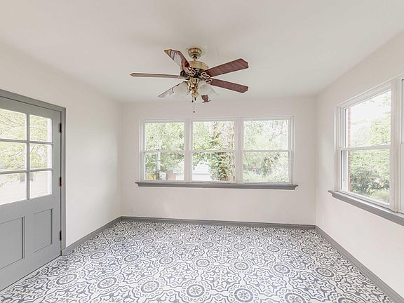 This sunroom will be your favorite part of the house, as the new windows provide a view of the green spaces surrounding the house. Read, lounge, snooze, entertain, watch TV....so many uses for this space.