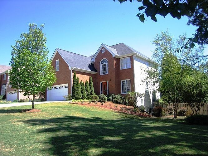 In excellent condition! Lovely fenced backyard!