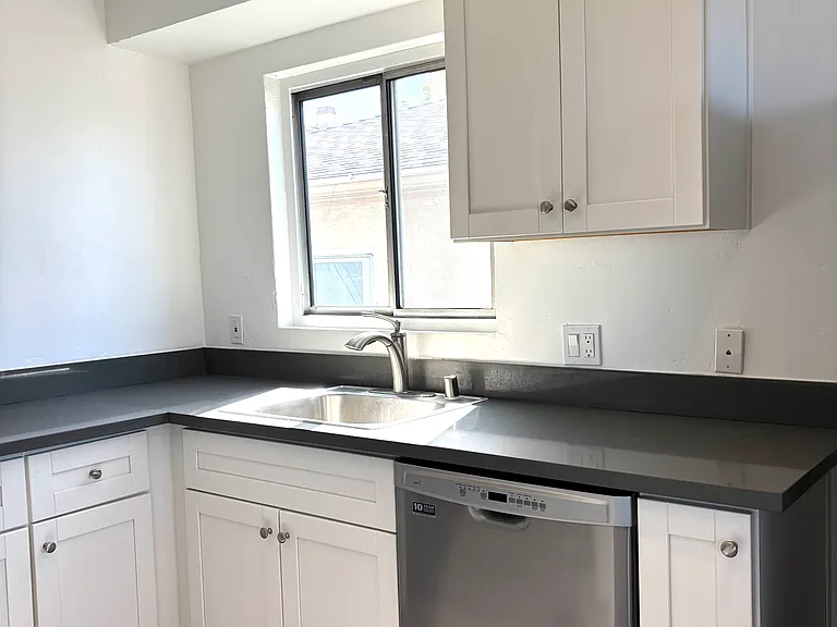Spacious kitchen storage, energy efficient dishwasher