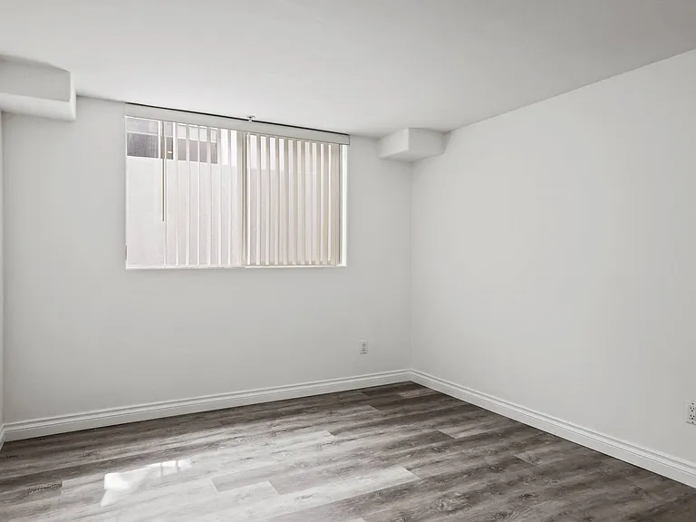 Bedroom with Vinyl Flooring and Large-Size Window