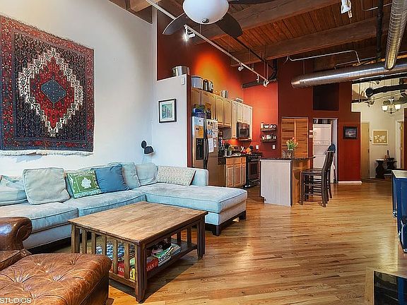Living area looking towards kitchen and entrance