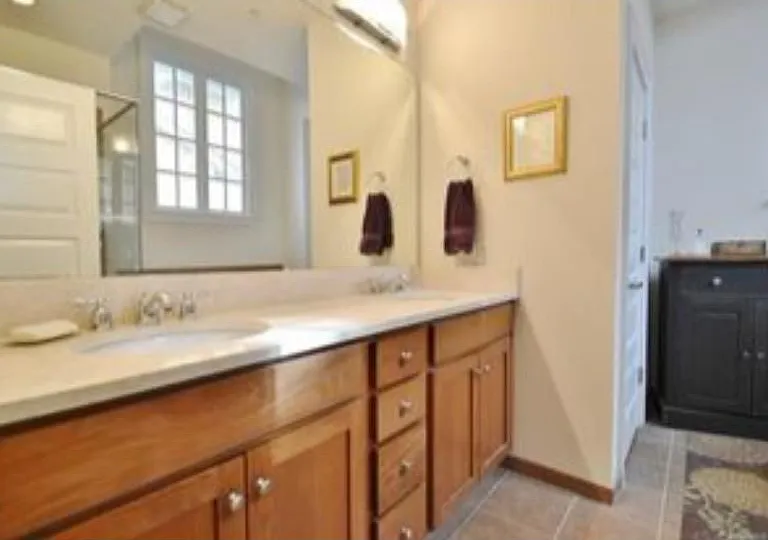 Primary bathroom with two sinks