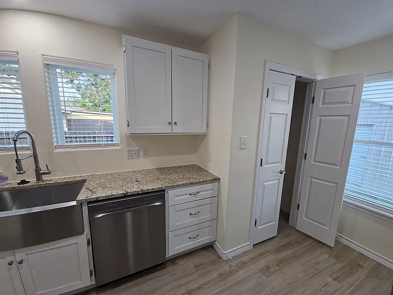Left side of the kitchen with pantry
