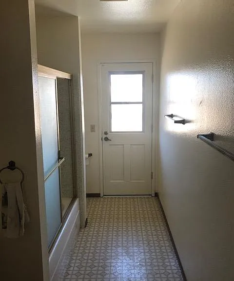 Door to Backyard in Bathroom
