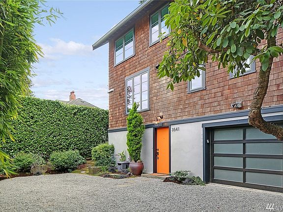 Front of the home with 1 car attached garage and plenty of parking.