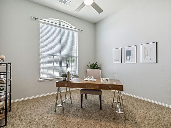 Roomy home office space with beautiful french doors