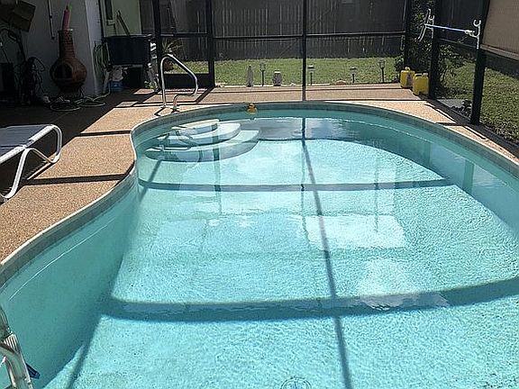 Pebble-tech in ground pool.