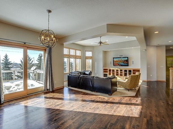 Informal Dining area that's bright and cheerful. View from kitchen/dining area towards living room.