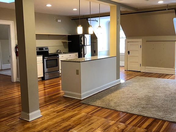 kitchen, dining, and living area