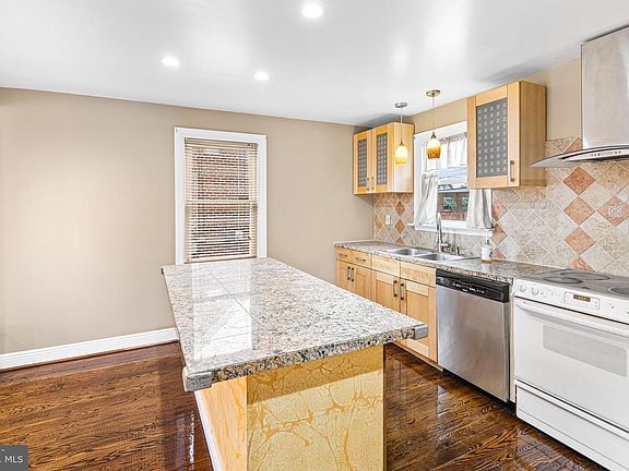 4th image of 8109 Bradford St