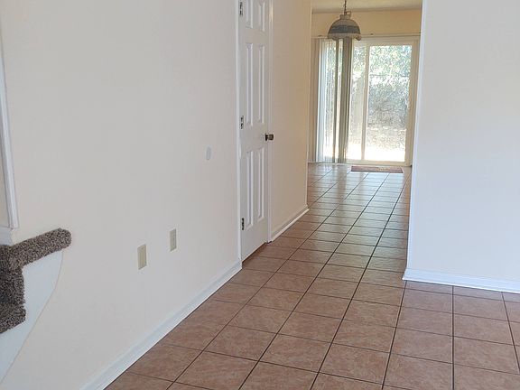 View to dining room, kitchen & patio.