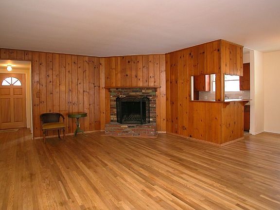 Large living room with newly refinshed wood floors