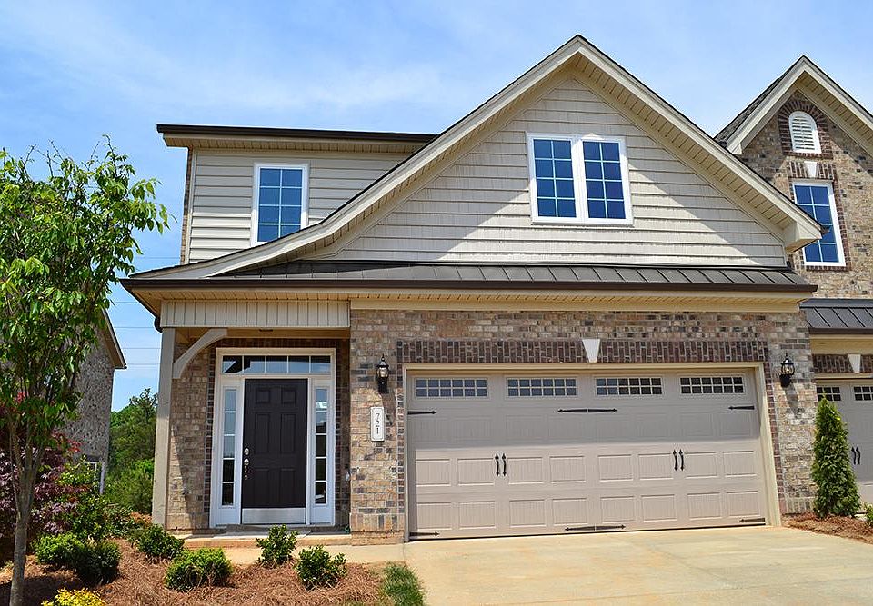 This two-story town home features a private master