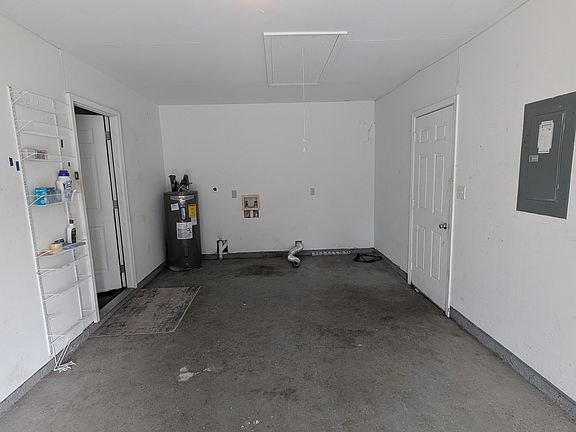 Garage with water heater and Washer/Dryer hook up. No Washer and Dryer machines provided to tenants.
