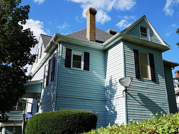 Rear of duplex property. Rental unit includes entire second and third floors.