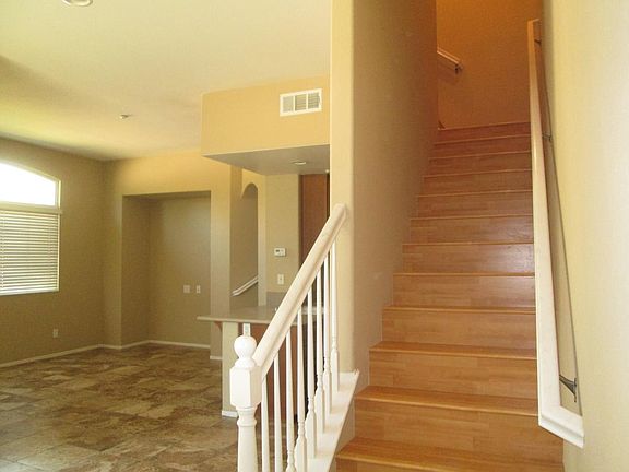Stairs to remaining bedrooms.