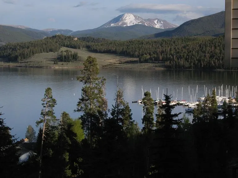 Summer view of marina, Lake Dillon and mountains.