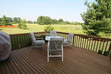 Deck overlooks green space