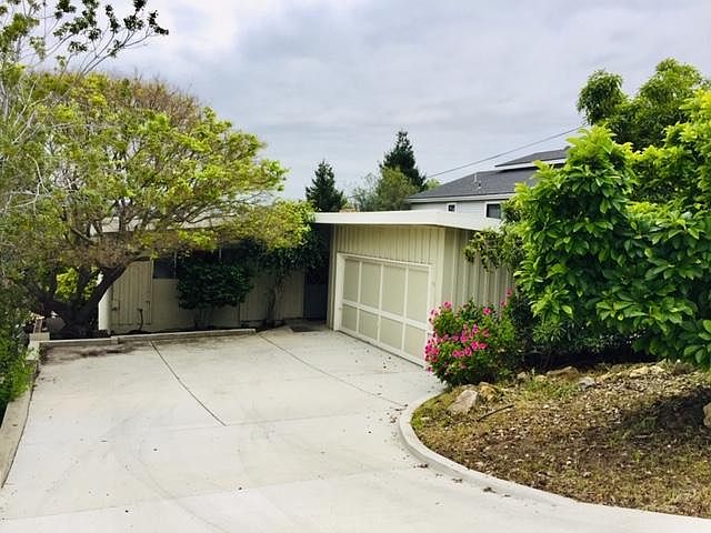 Mature landscaping, both front and back yards.