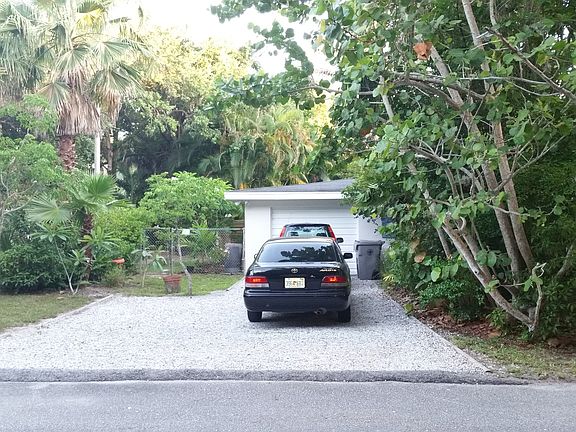 2nd driveway around corner